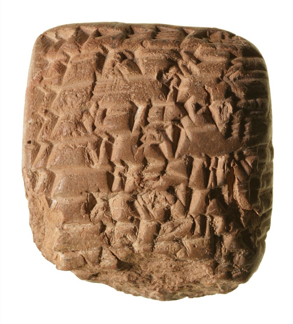 Figure 1 : An Akkadian clay tablet covered in cuneiform writing. Once a scribe pressed the wedge-shaped signs into damp clay, the tablet dried in the sun almost as hard as pottery. Photo: Wikimedia Commons / Public Domain.